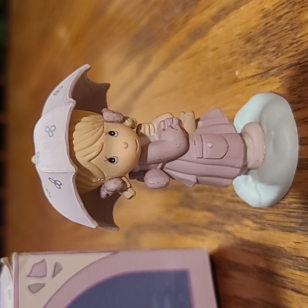 Precious Moments Miniature Figurine  - April